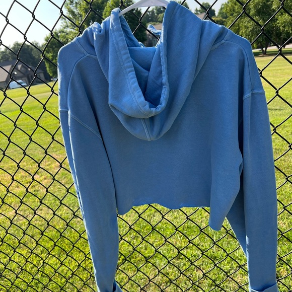 “Good Energy” hoodie in size large with wording “Thru the Lows” on one sleeve. - Picture 2 of 4